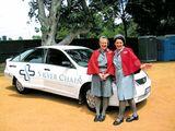 Dressed in 1940s Silver Chain uniforms, nurses Maggie Phillipson (left) and Nelly Newall